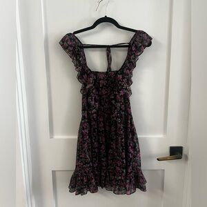 Ruffle detail black ground floral mini dress